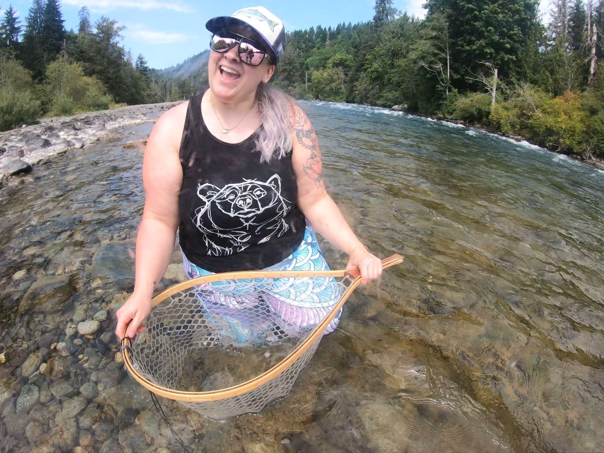 Fishe ambassador Katie Dowe fly fishing in Canada