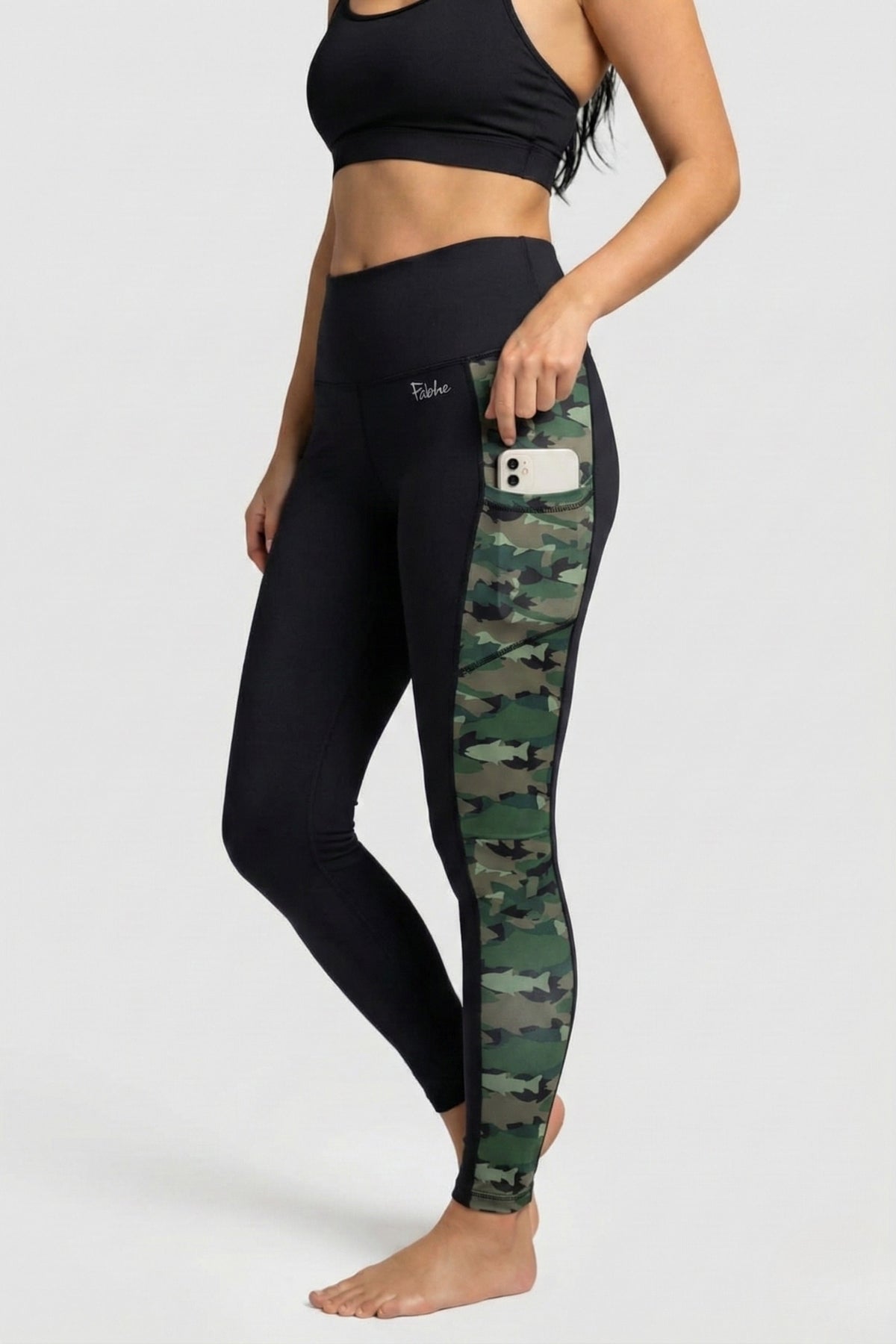Black leggings with camouflage pattern on a white background