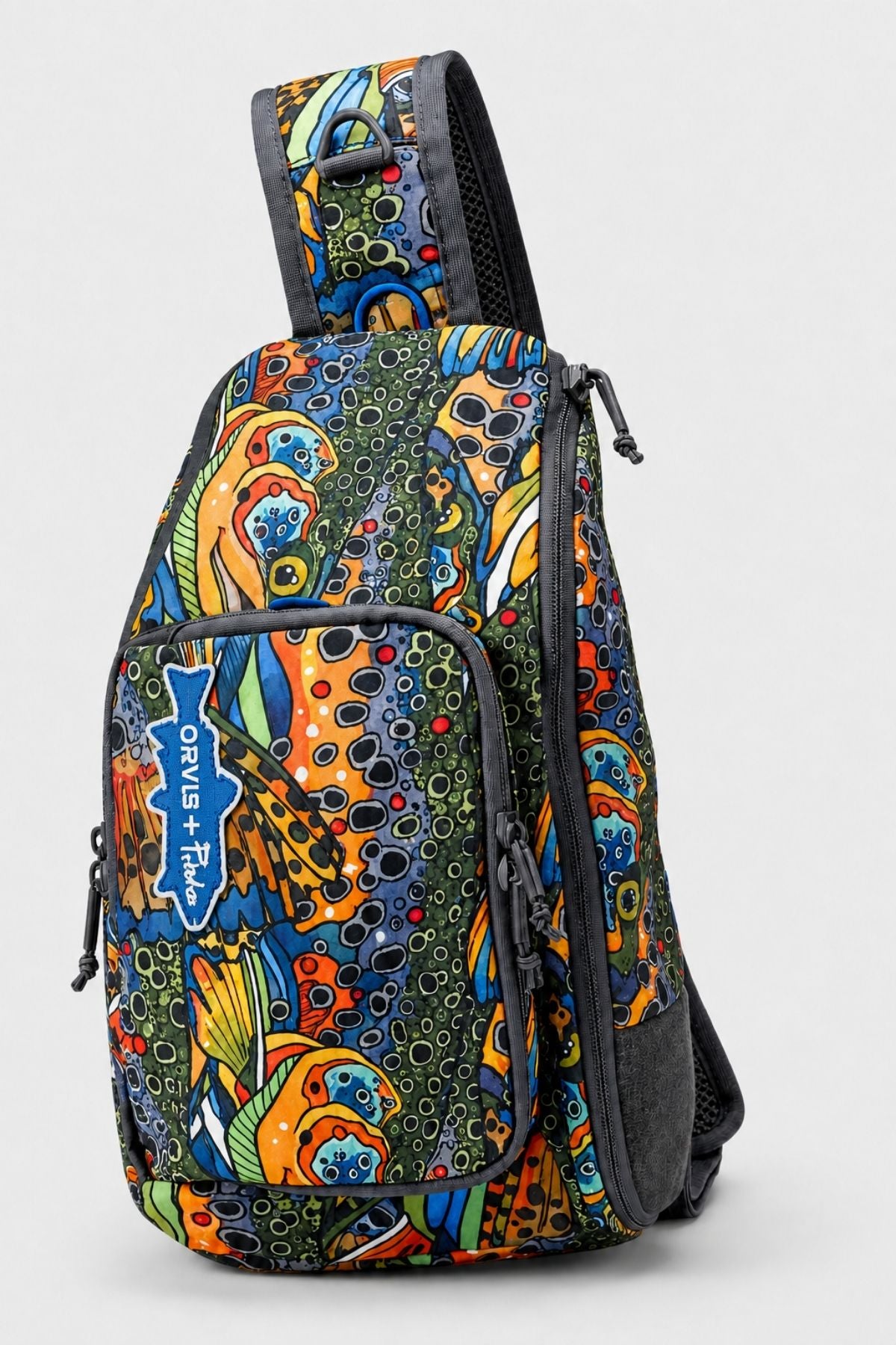 Colorful patterned sling bag on a white background