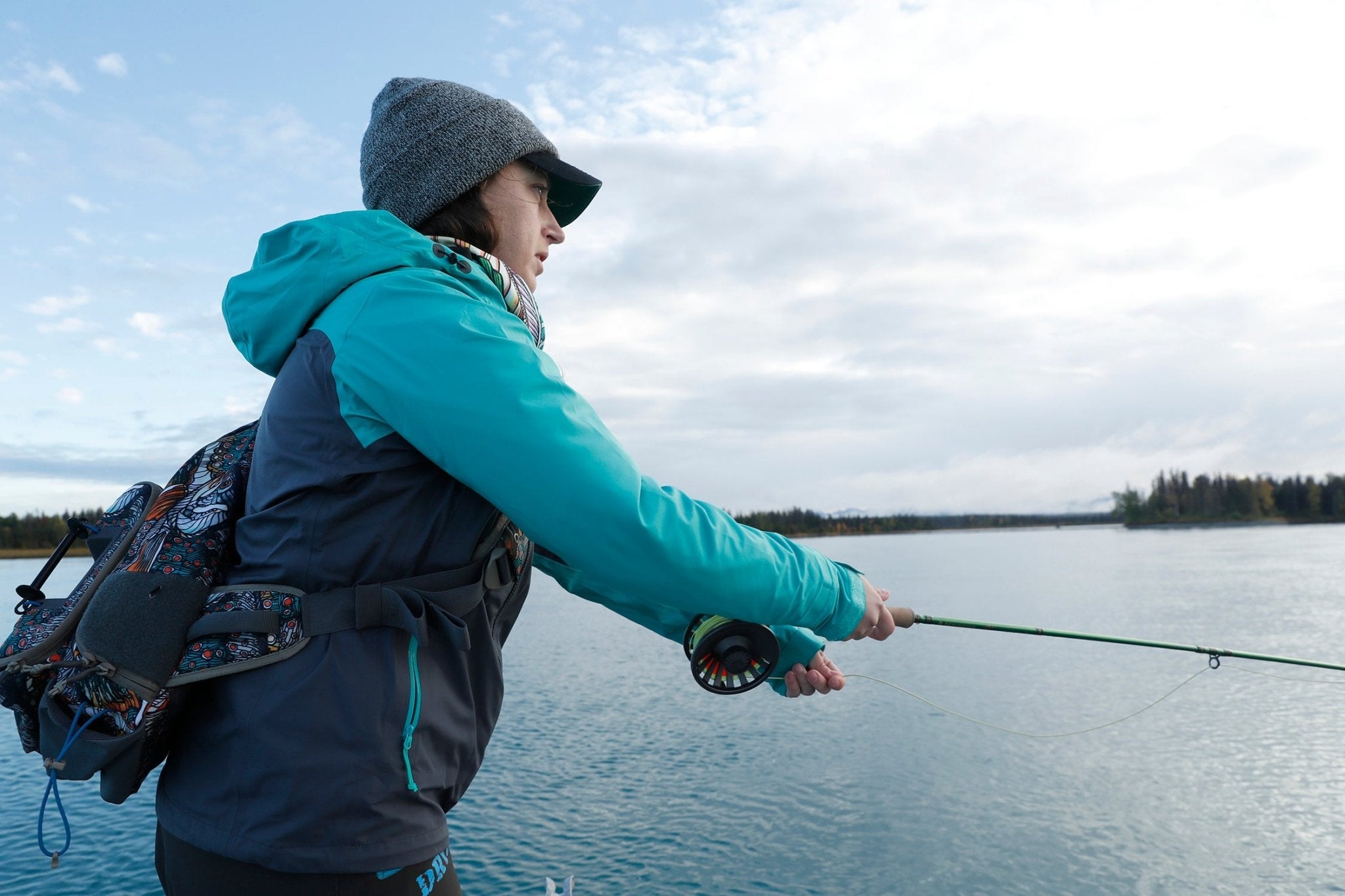 Libby Ouellette fishing in Alaska for a Fishe team profile