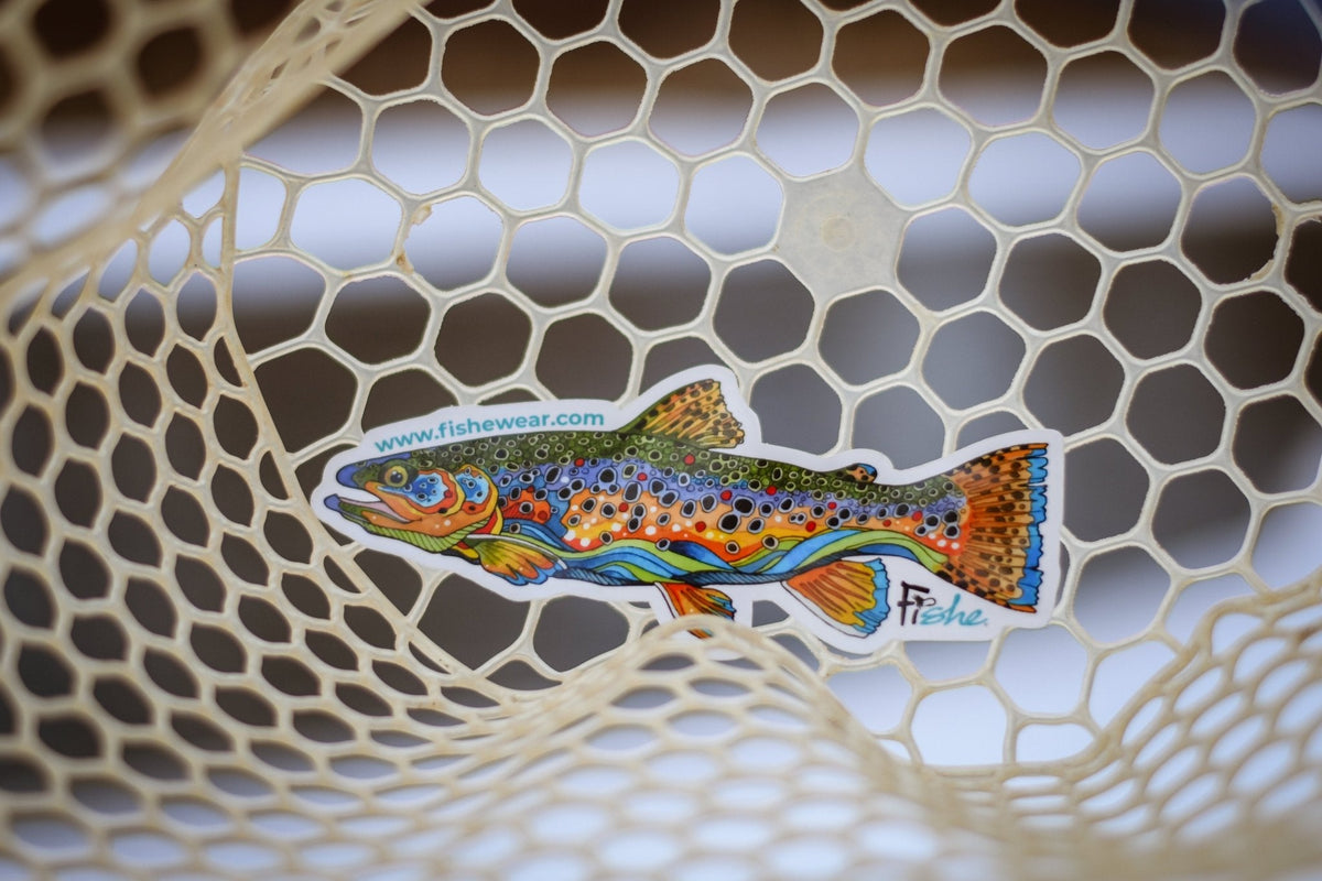 Angler wearing the Fishe Unbound Brown trout pattern outdoors