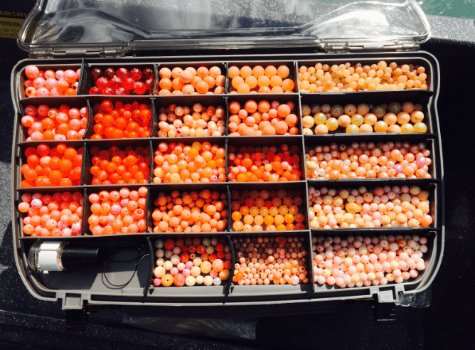 Hand-painted fishing beads in salmon egg colors