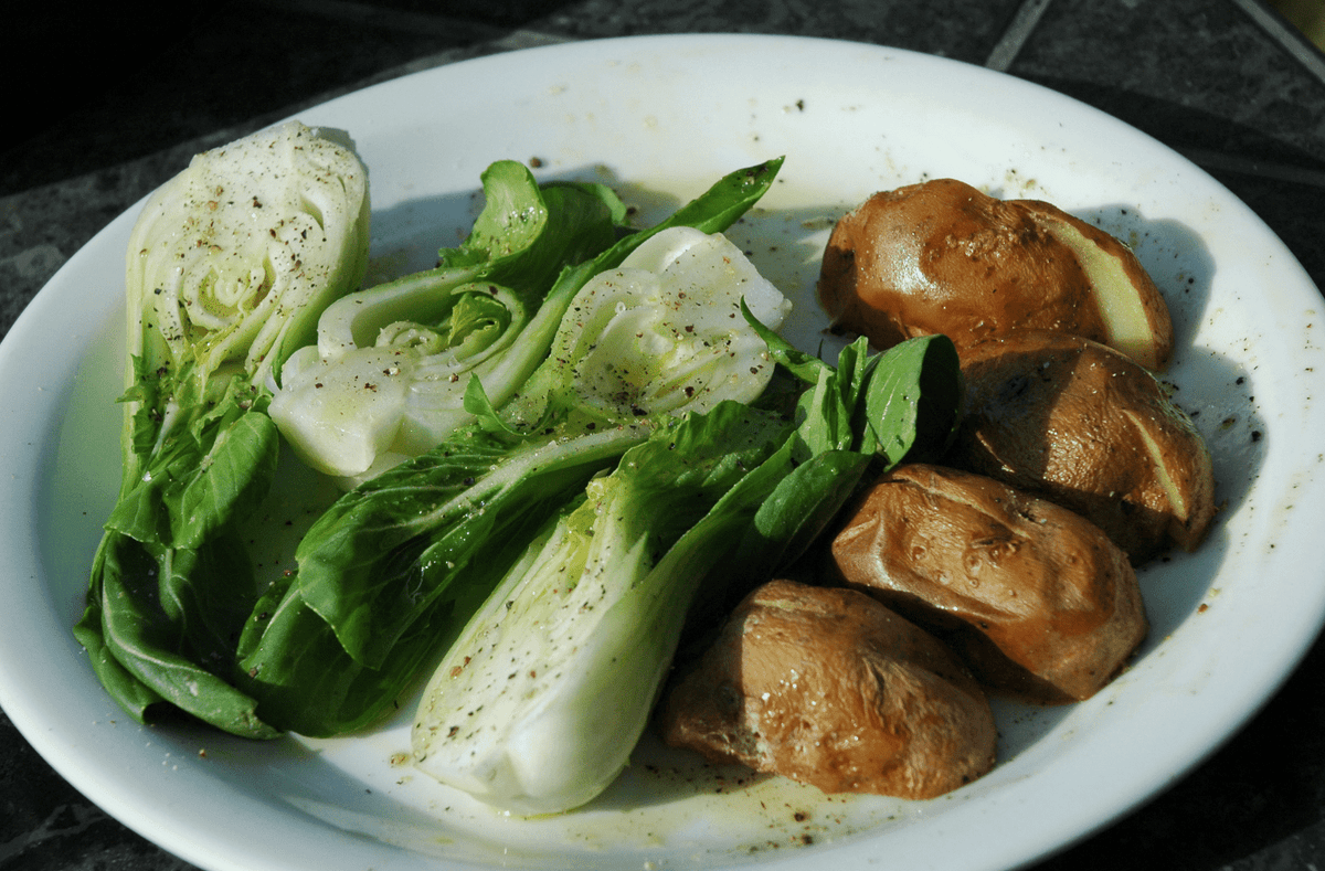 Grilled bok choy and potatoes served as a simple side dish