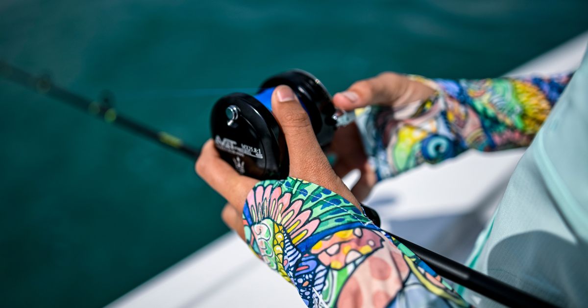 Women with fishing reel in hand