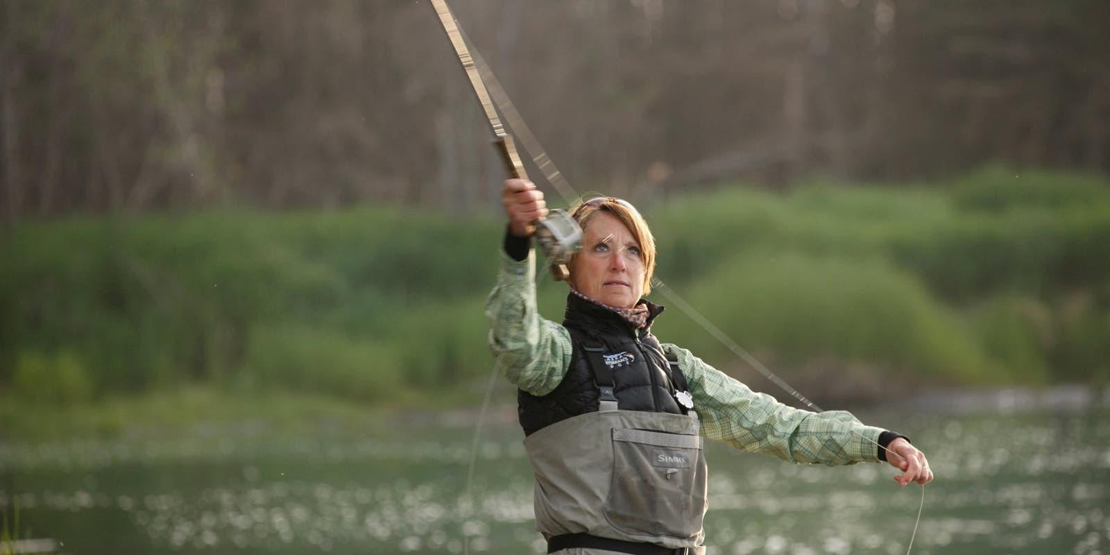 FisheWear founder Linda Leary outdoors during a fly-fishing adventure