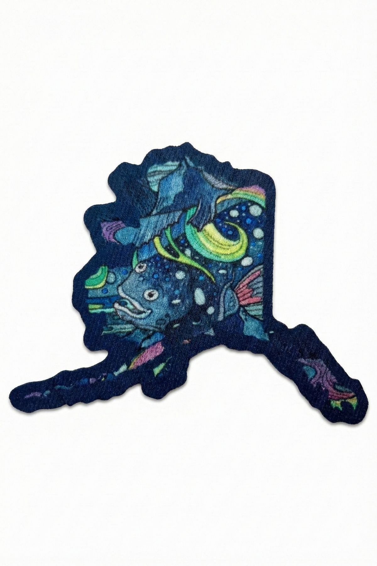 Colorful fish-shaped toy on a white background