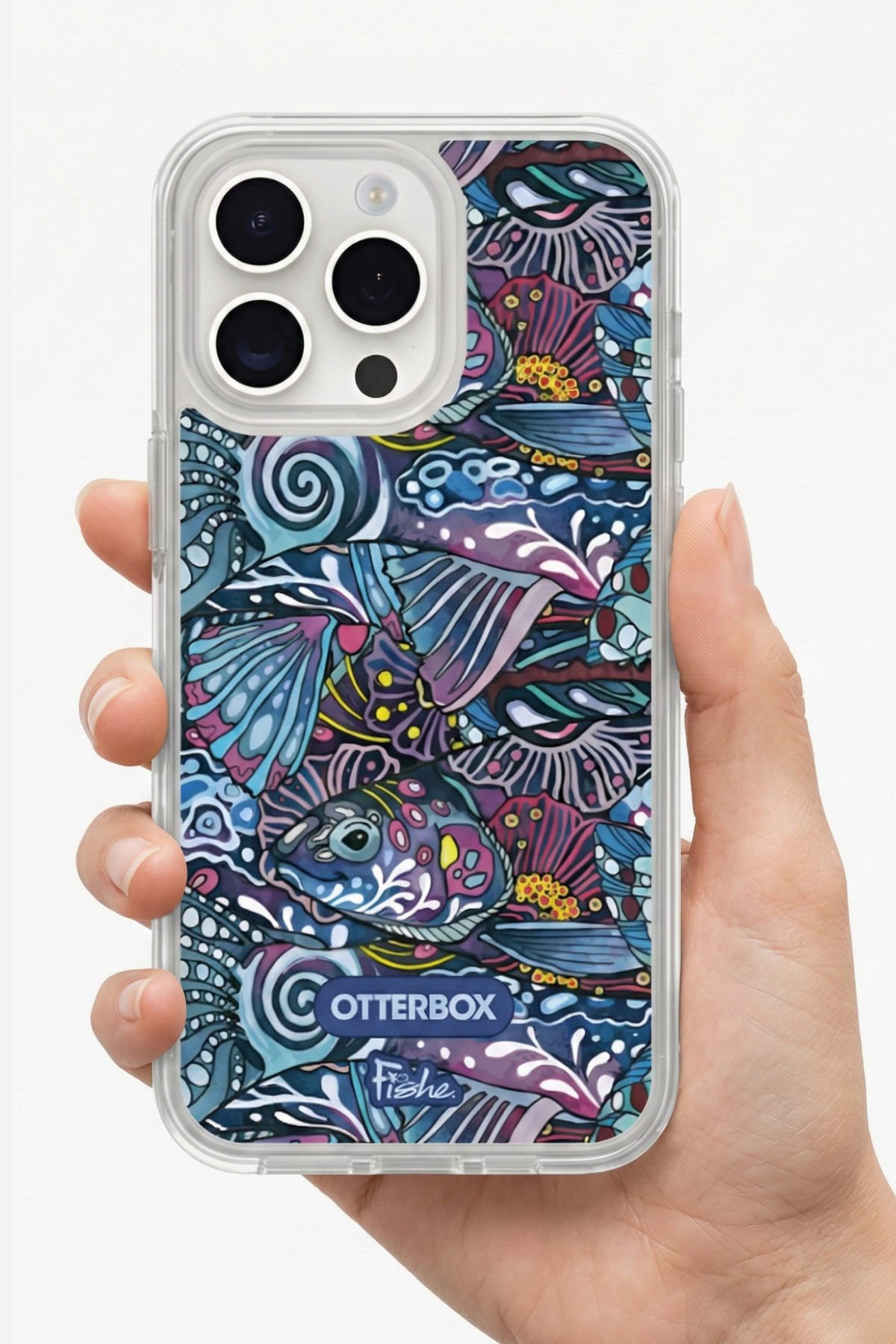 Colorful phone case with a pattern held by a hand, featuring the OtterBox brand.