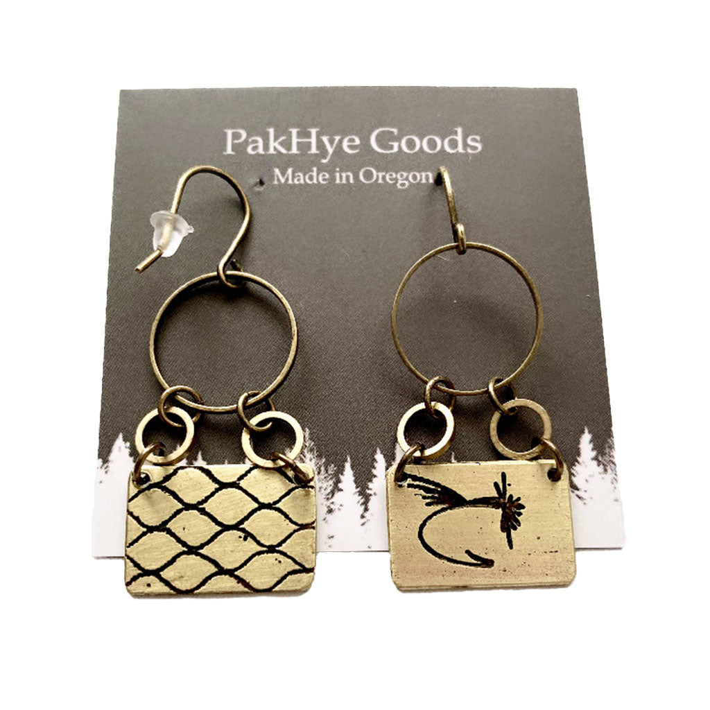 Front and back view of the Etched Scale Earrings featuring a fishing fly on the front and fish scales on the back